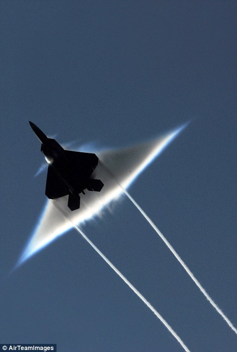 The image  shows the effect of a sonic boom from below the aircraft