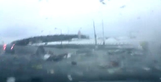 Panic: Debris is strewn everywhere after the plane hit the highway
