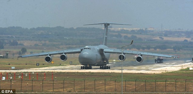 This file photo shows a US Air Force C-5 Galaxy Outsize Cargo Transport Aircraft landing at Incirlik air base in Turkey in 2015. The U.S. military has suspended air strikes against the Islamic State group in Syria and Iraq from a base in southern Turkey, a U.S. official said